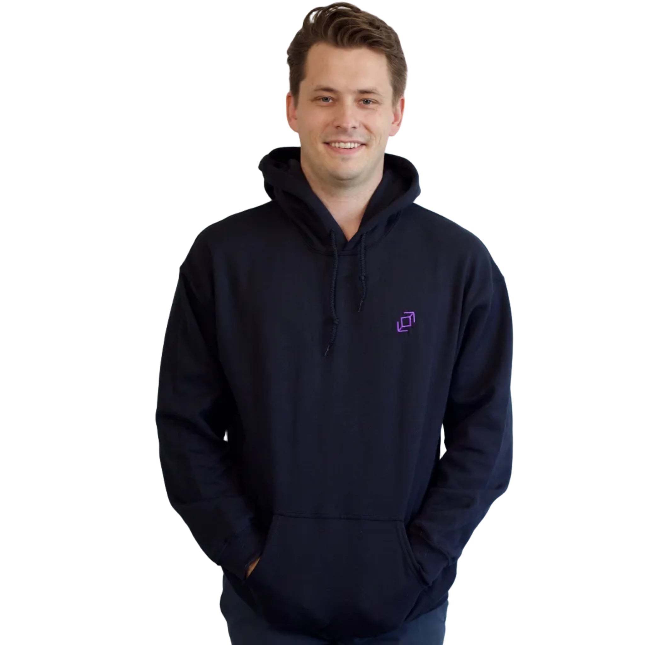 A man wearing a black push pass whip hoodie with a small purple geometric whip logo on the left chest, standing against a plain white background.
